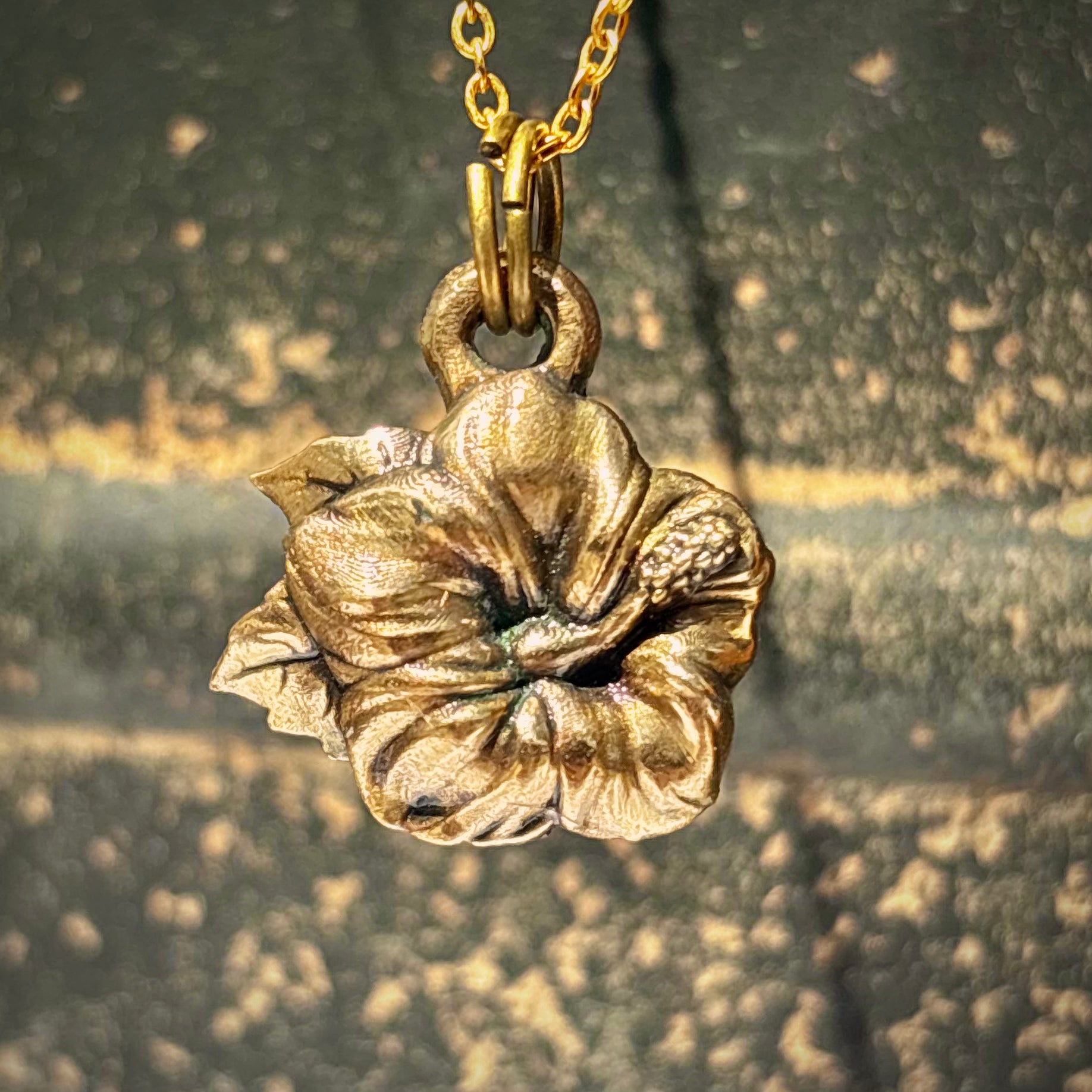 Flor de Maga, Bronze Pendant, $30
